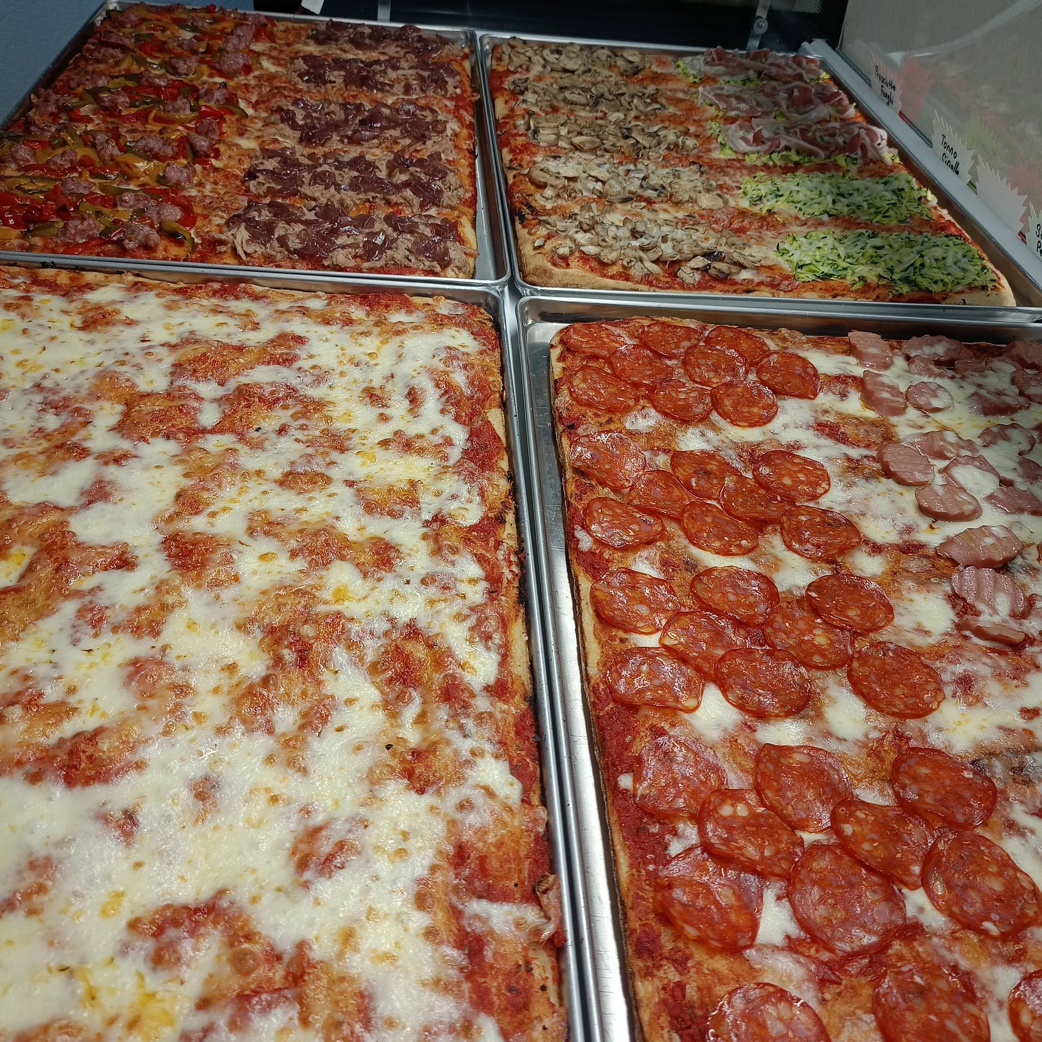 Selezione di pizze al taglio Fetta Street