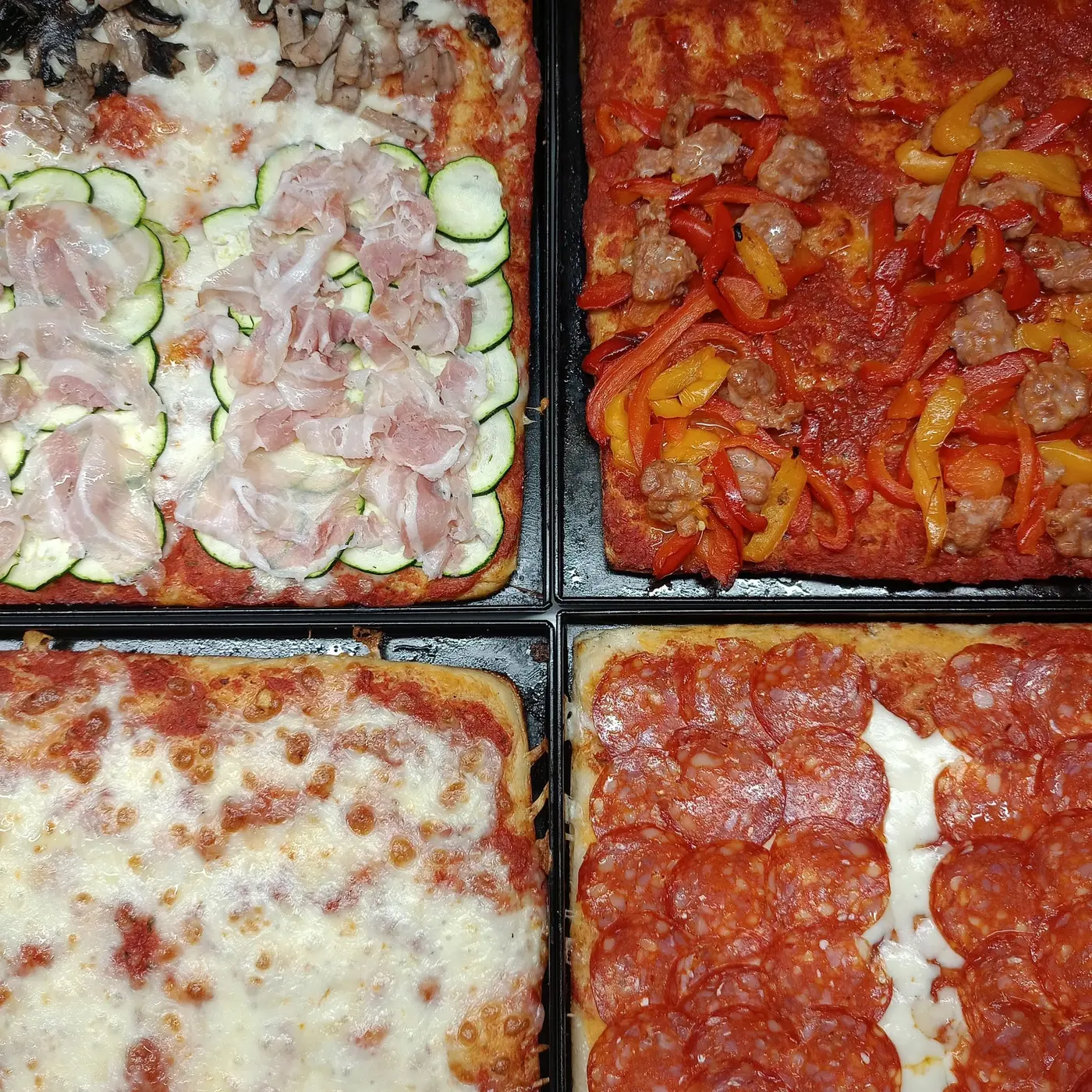 Selezione completa di pizze al taglio